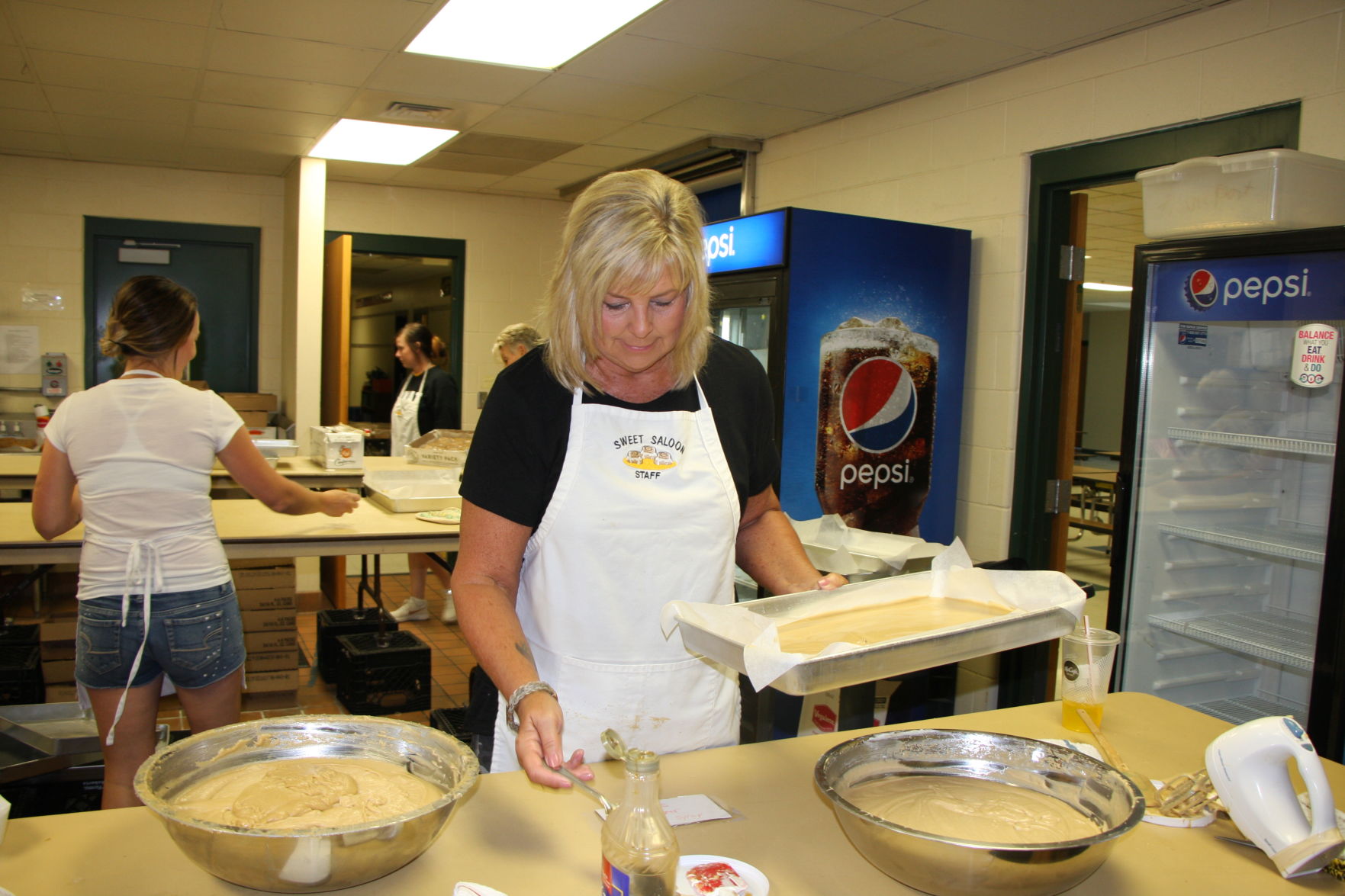 Colleen May helps out with the dough